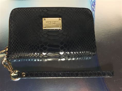 Michael Kors black python wallet/wristlet. 